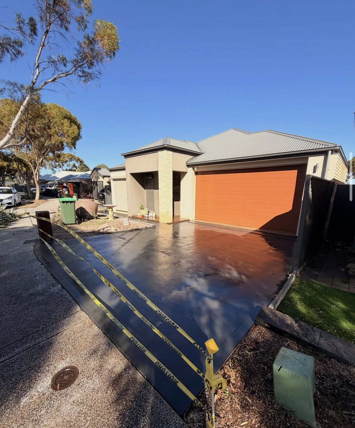 Charcoal concrete driveway at Blakeview
